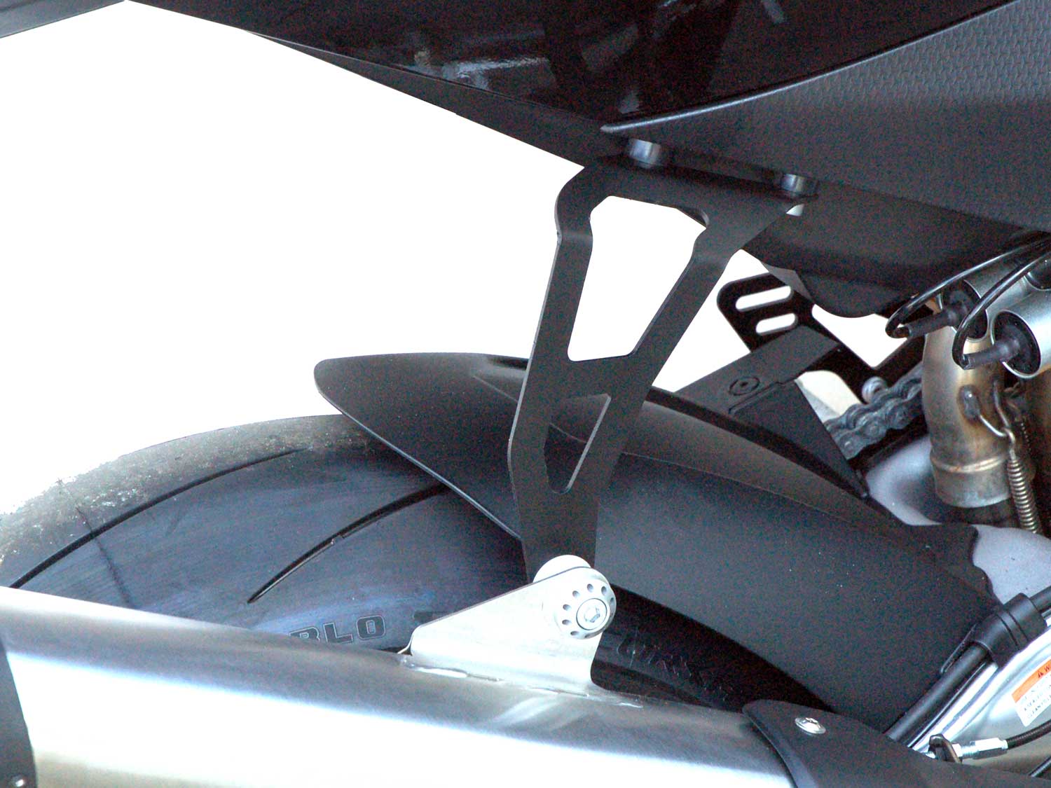 Supporto di scarico per Aprilia RSV4 | Tuono V4 (2021-2025) Supporto di scarico per Aprilia RSV4 | Tuono V4 (2021-2025)