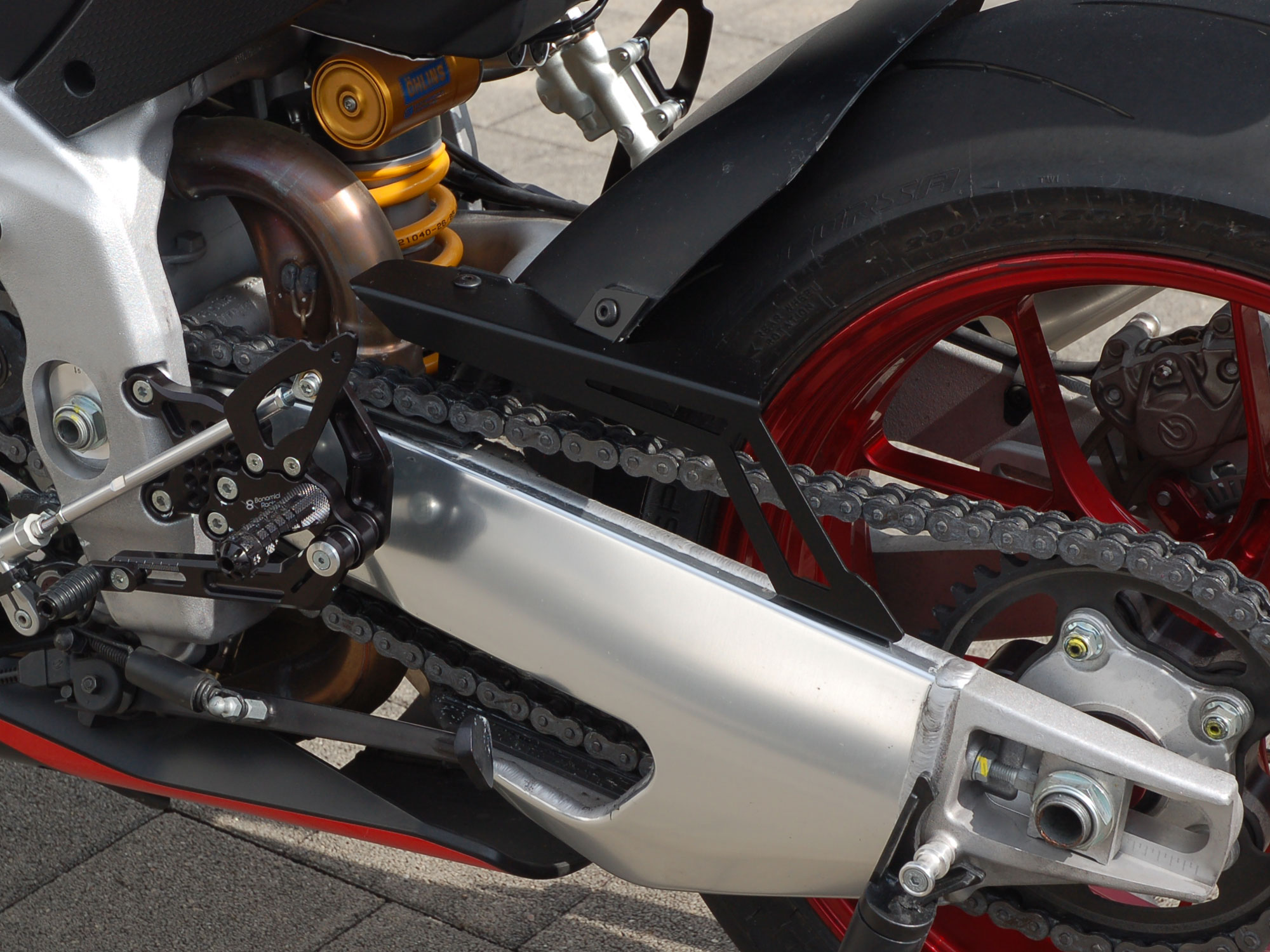 Paracatena per Aprilia RSV4 | Tuono V4 (2021-2026) Paracatena per Aprilia RSV4 | Tuono V4 (2021-2026)