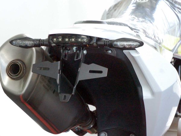 Porta matrícula IQ1 para Husqvarna 701 (2016-2024) con luz trasera